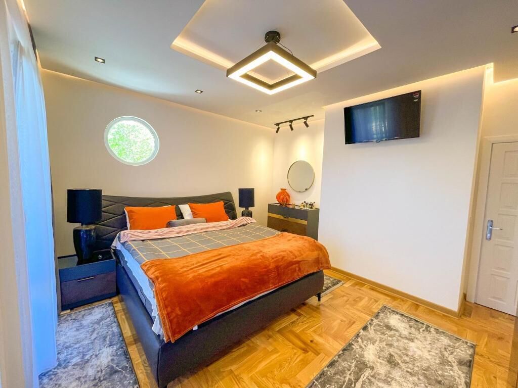 Căn hộ Deluxe, ban công, quang cảnh hồ bơi | Phòng cách âm, truy cập Internet không dây miễn phí 