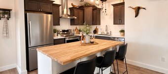 June Special: Brand-New Premium 1BR Suite That Sleeps 4 + Rental Car Credit