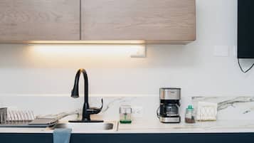 Microwave, coffee/tea maker, cookware/dishes/utensils