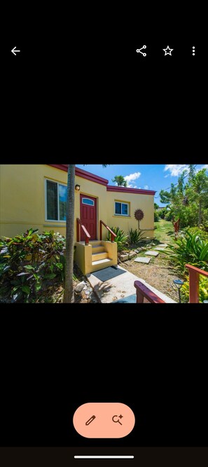 Exterior - Romantic Hideaway 1-bedroom cottage with AC , a huge deck with an amazing view. (kingshill)
