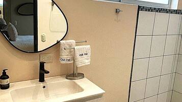 Hair dryer, towels, soap, toilet paper