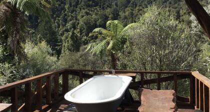 Wholly Offgrid Cosy Cabins. Low EMF. No Wifi, Walks to Waterfalls instead.
