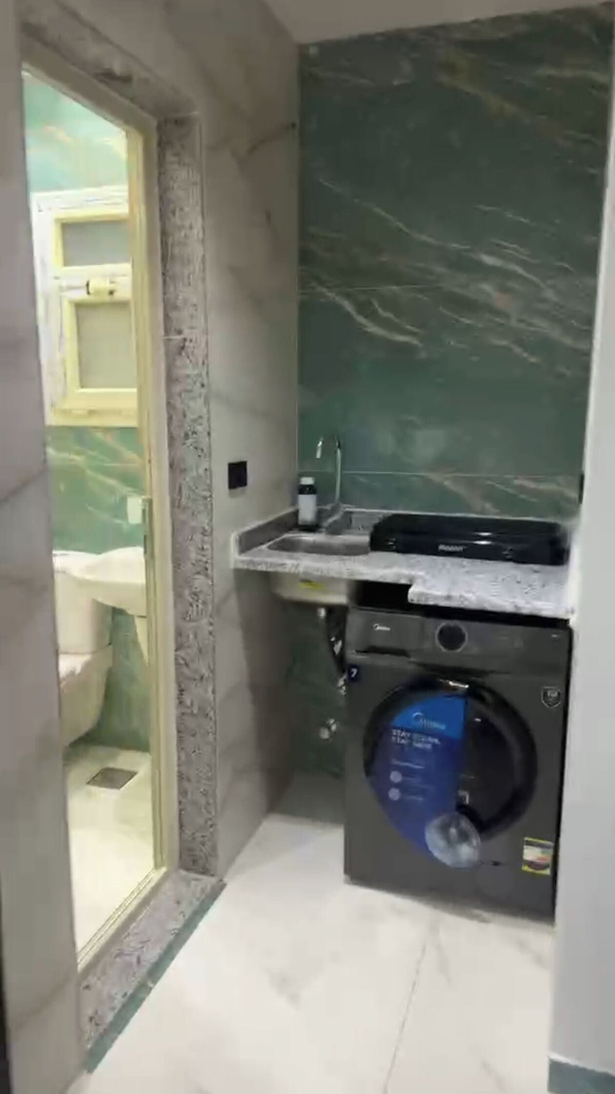 Shower, towels, soap, toilet paper