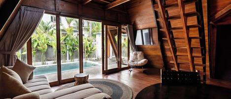Villa Deluxe, vista al jardín | Interior