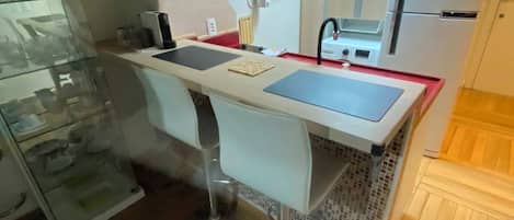 Fridge, microwave, stovetop, coffee/tea maker