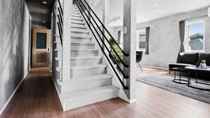 Apartment | Living area | 50-inch flat-screen TV with digital channels, foosball
