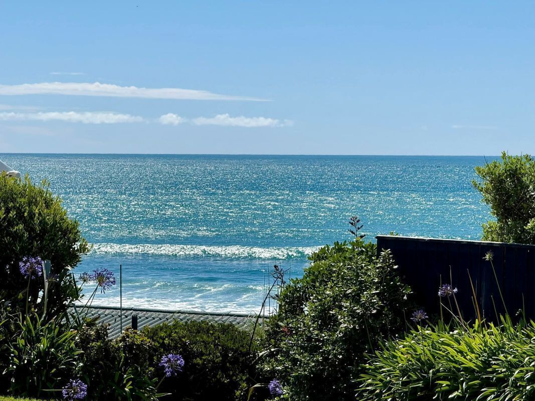 On the beach, sun loungers, beach towels