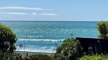 On the beach, sun loungers, beach towels