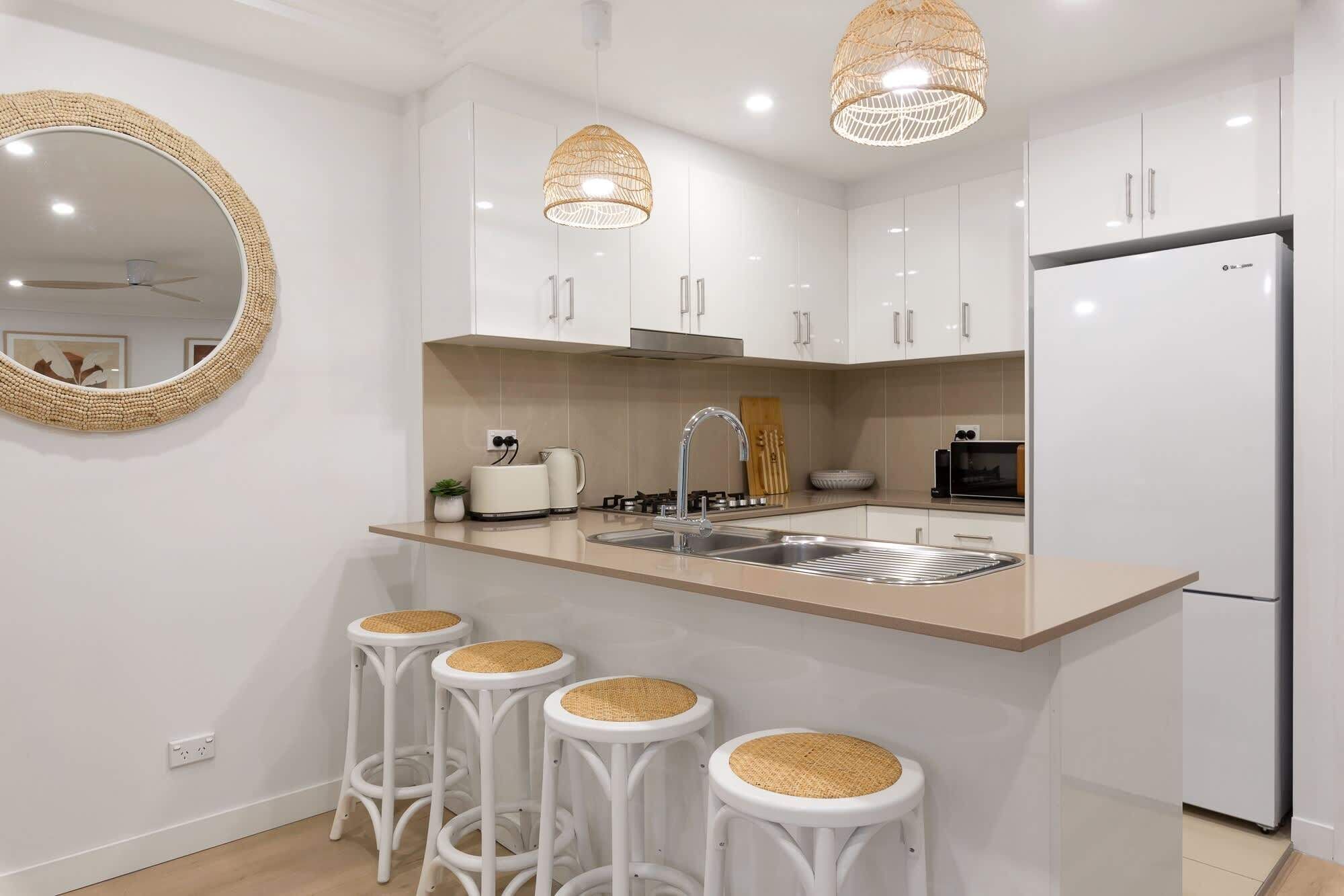 Coffee/tea maker, fridge, microwave, oven
