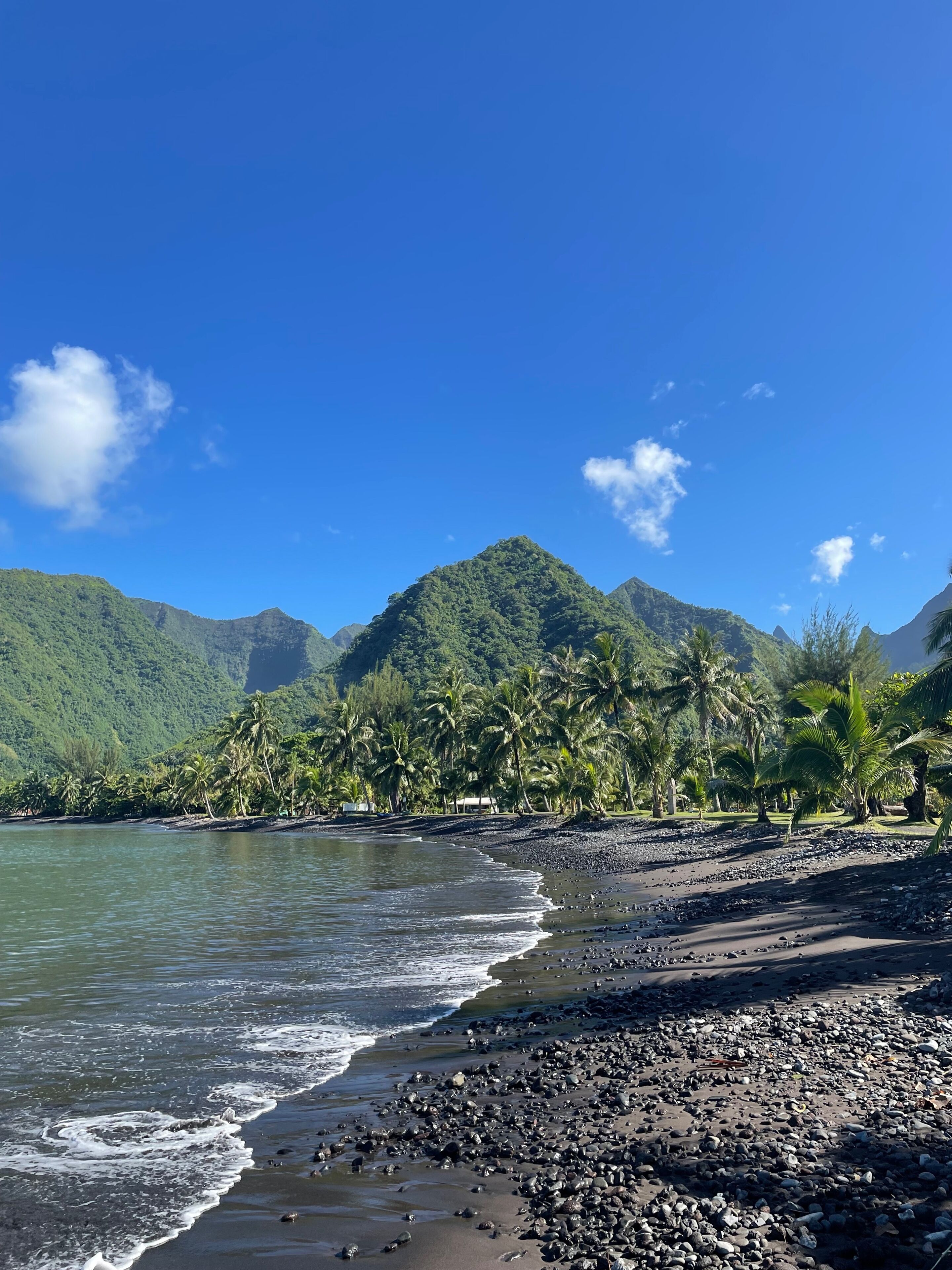 On the beach, black sand