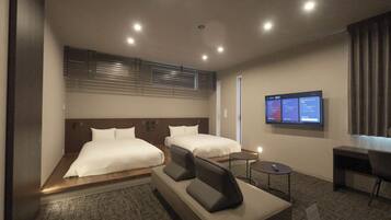 Deluxe Twin Room, Non Smoking | Desk, laptop workspace, blackout drapes, soundproofing
