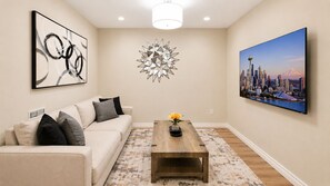Living area - Serene Waterfront Escape - 2BR with Mountain Views & A/C (Seattle)