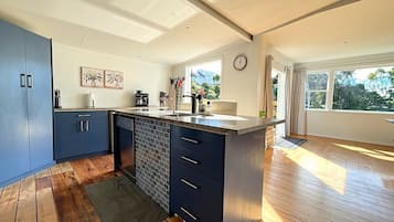 Coffee/tea maker, fridge, microwave, oven