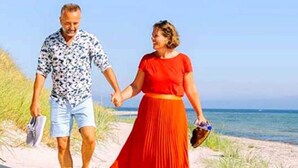 A couple walking on a sandy path by the beach. - 2 Person Holiday Park Home in Nexo (Nexø)