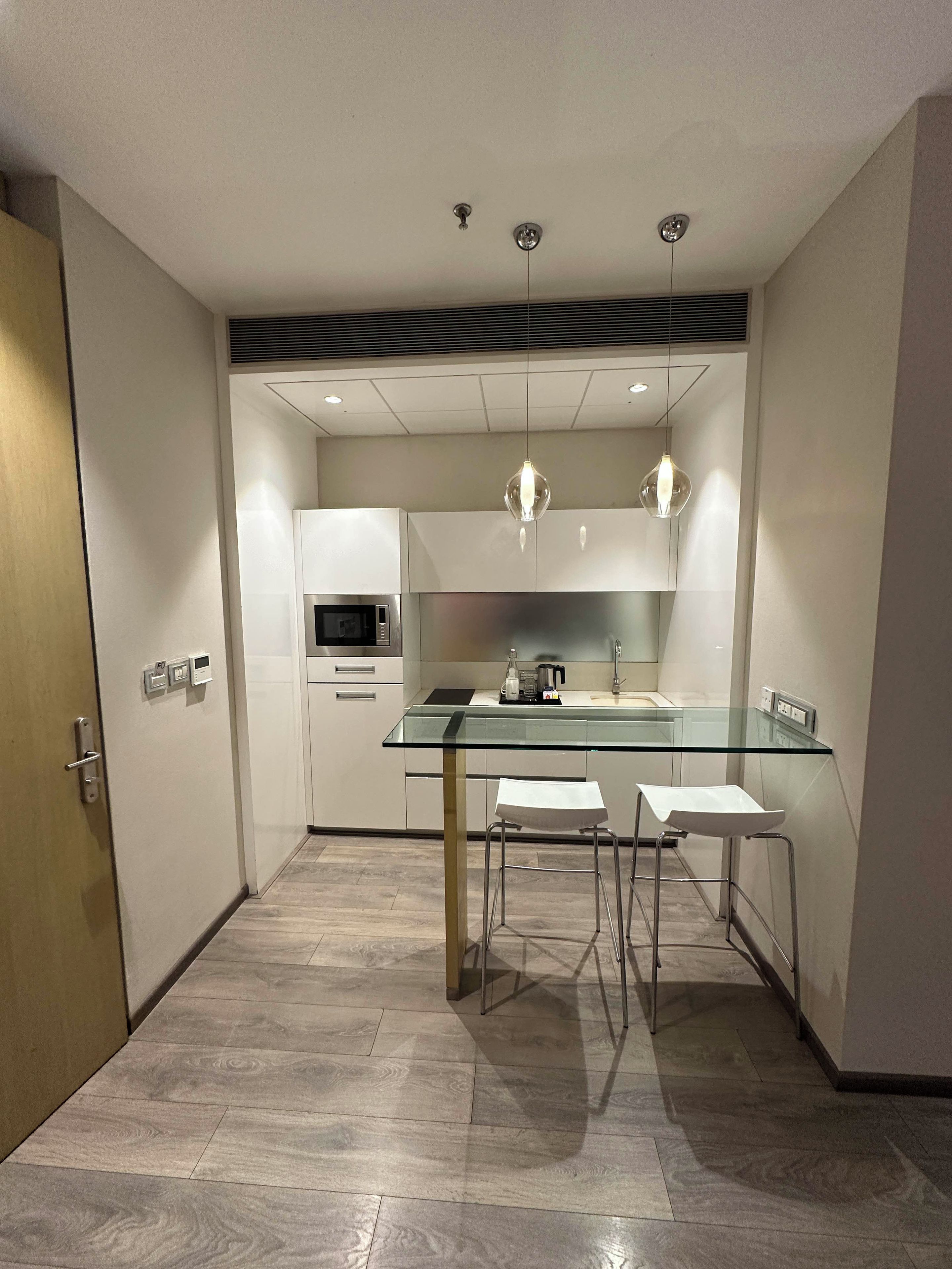 Mini-fridge, microwave, oven, cookware/dishes/utensils