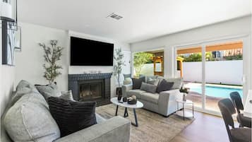 Smart TV, fireplace, table tennis, books