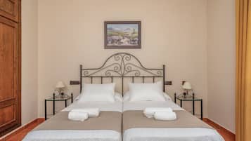 Quartos à prova de som, Wi-Fi de cortesia, roupa de cama