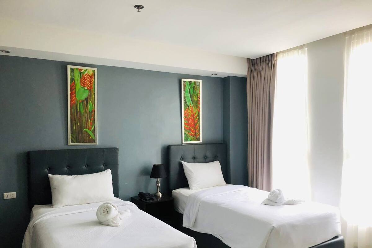 Twin Room, River View | Down comforters, WiFi (free), bed sheets