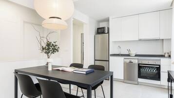 Family Apartment, 2 Bedrooms | Private kitchen | Coffee/tea maker, full-size fridge, microwave, stovetop