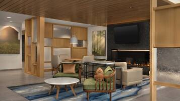 A modern living room with a fireplace, comfortable seating, and a large TV screen.