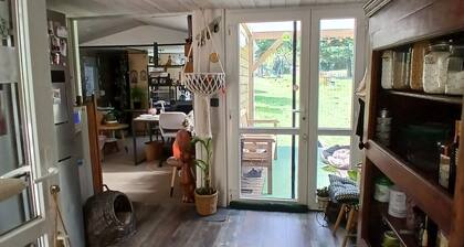 Spacious Wooden Chalet with Terrace and Play Area