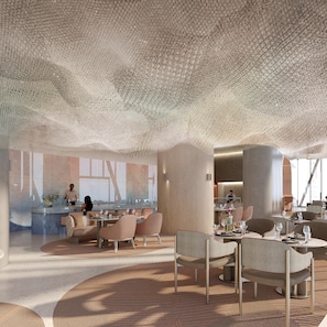 A modern interior with a unique ceiling design, a bar area, and seating arrangements.