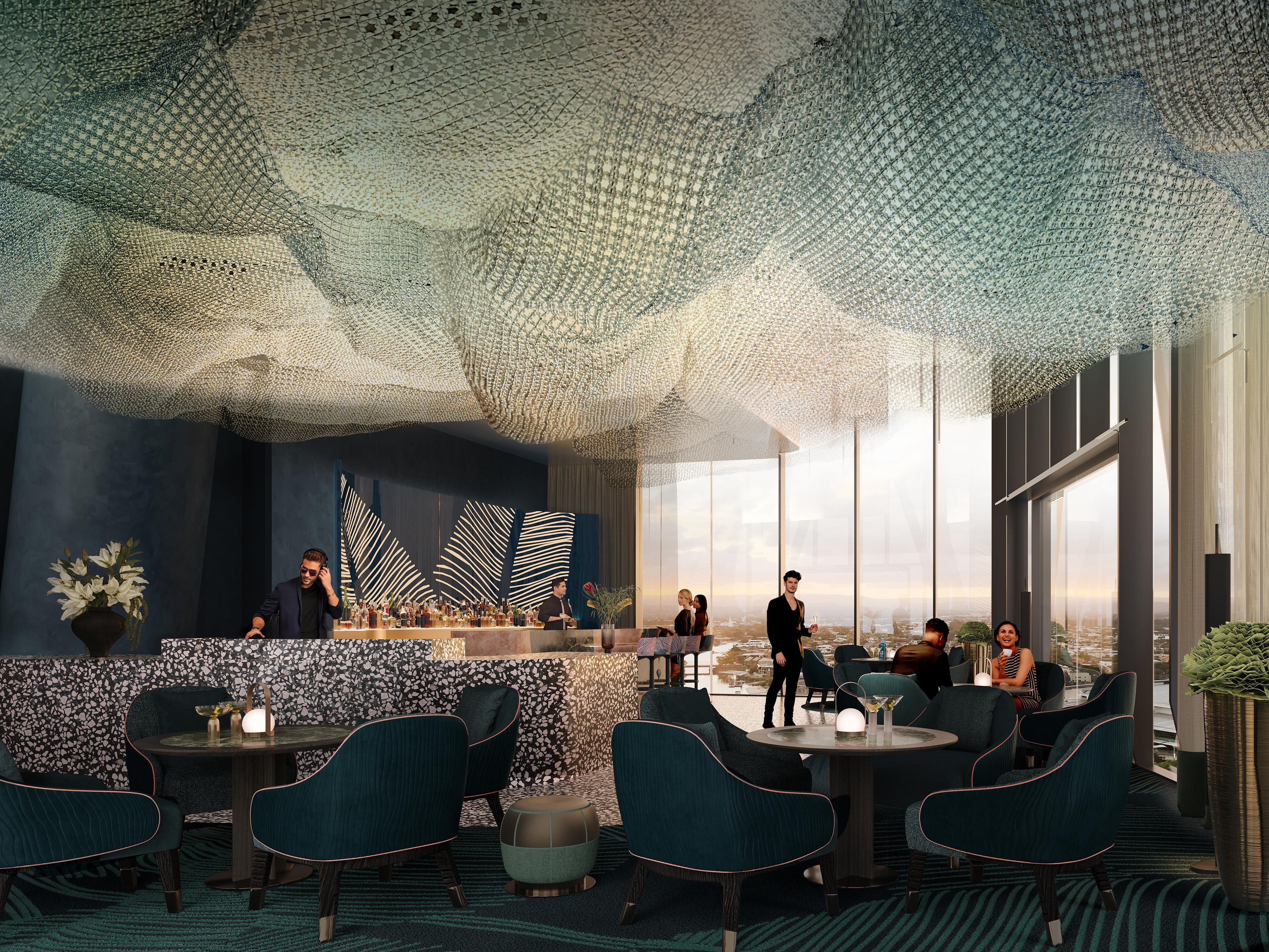 A modern bar area with a high ceiling, seating arrangements, and a city view.