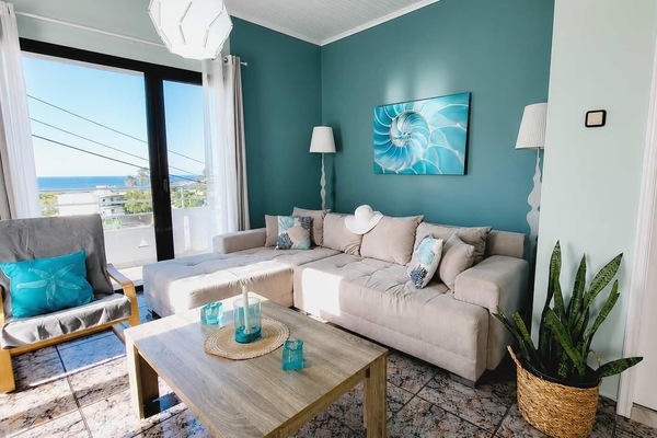Bright Living Room with Sea Views and Comfortable Sofa