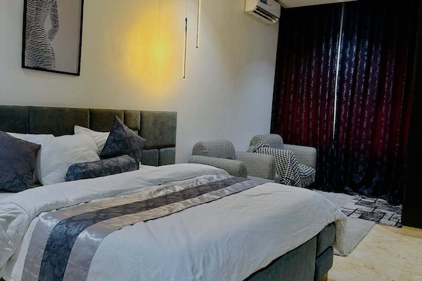 Deluxe Room, Balcony, City View | Desk, laptop workspace, blackout drapes, soundproofing