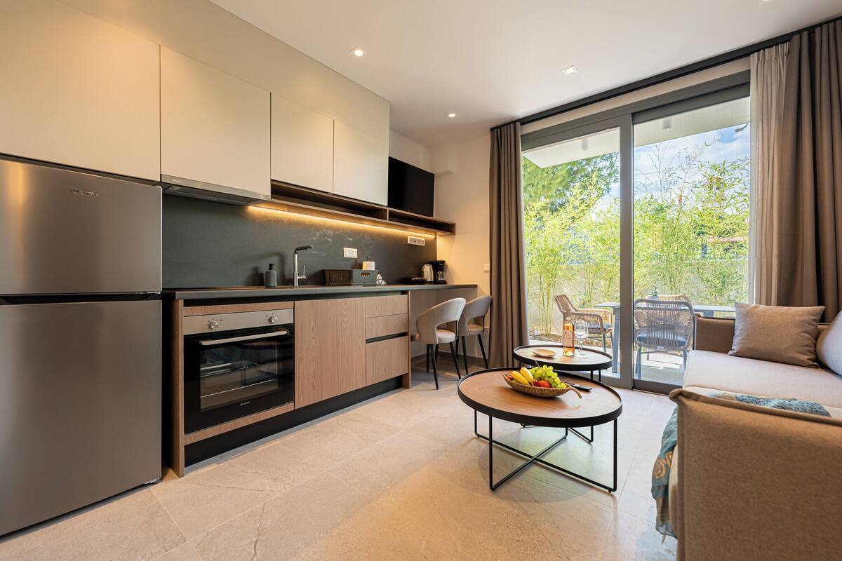 Standard Garden View Apartment | Ferros/tábuas de passar roupa, berços grátis, Wi-Fi de cortesia