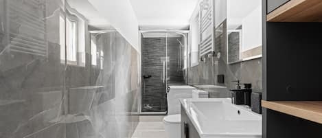 Shower, jetted tub, hair dryer, bidet