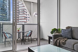 Living area - 1BR Docklands | Walk to Marvel Stadium + Balcony (Docklands)