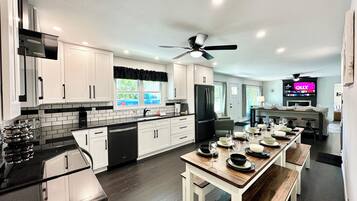 Coffee/tea maker, fridge, microwave, oven