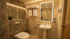 Deluxe Double Room | Bathroom | Shower, slippers, towels, soap - Tulip Inn Bengaluru Hoodi (Bengaluru)