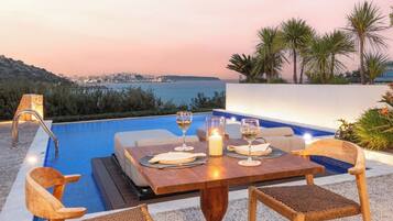 Deluxe Suite, Sea View | Pool | Outdoor pool