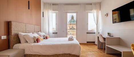 Premium bedding, down duvets, minibar, in-room safe