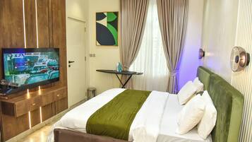 Economy Apartment, Balcony, City View | In-room safe, desk, laptop workspace, blackout curtains