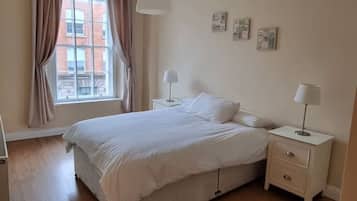 Iron/ironing board, travel crib, WiFi, bed sheets