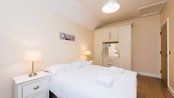 Iron/ironing board, travel crib, WiFi, bed sheets
