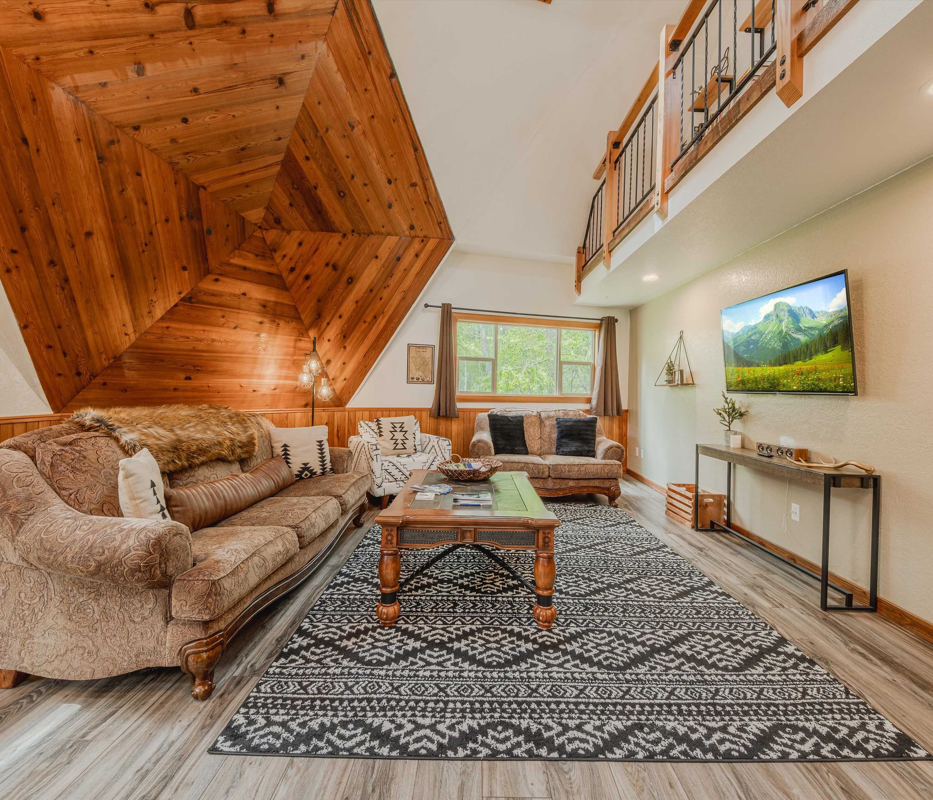 Cabin, Multiple Beds, Fireplace, Garden View (Gateway to Glacier) | Living area