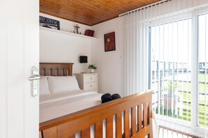 2 dormitorios, tabla de planchar con plancha, wifi gratis y ropa de cama