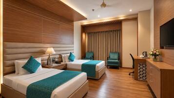 Executive Room | Iron/ironing board, bed sheets