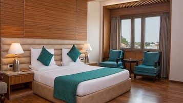 Executive Room | Iron/ironing board, bed sheets