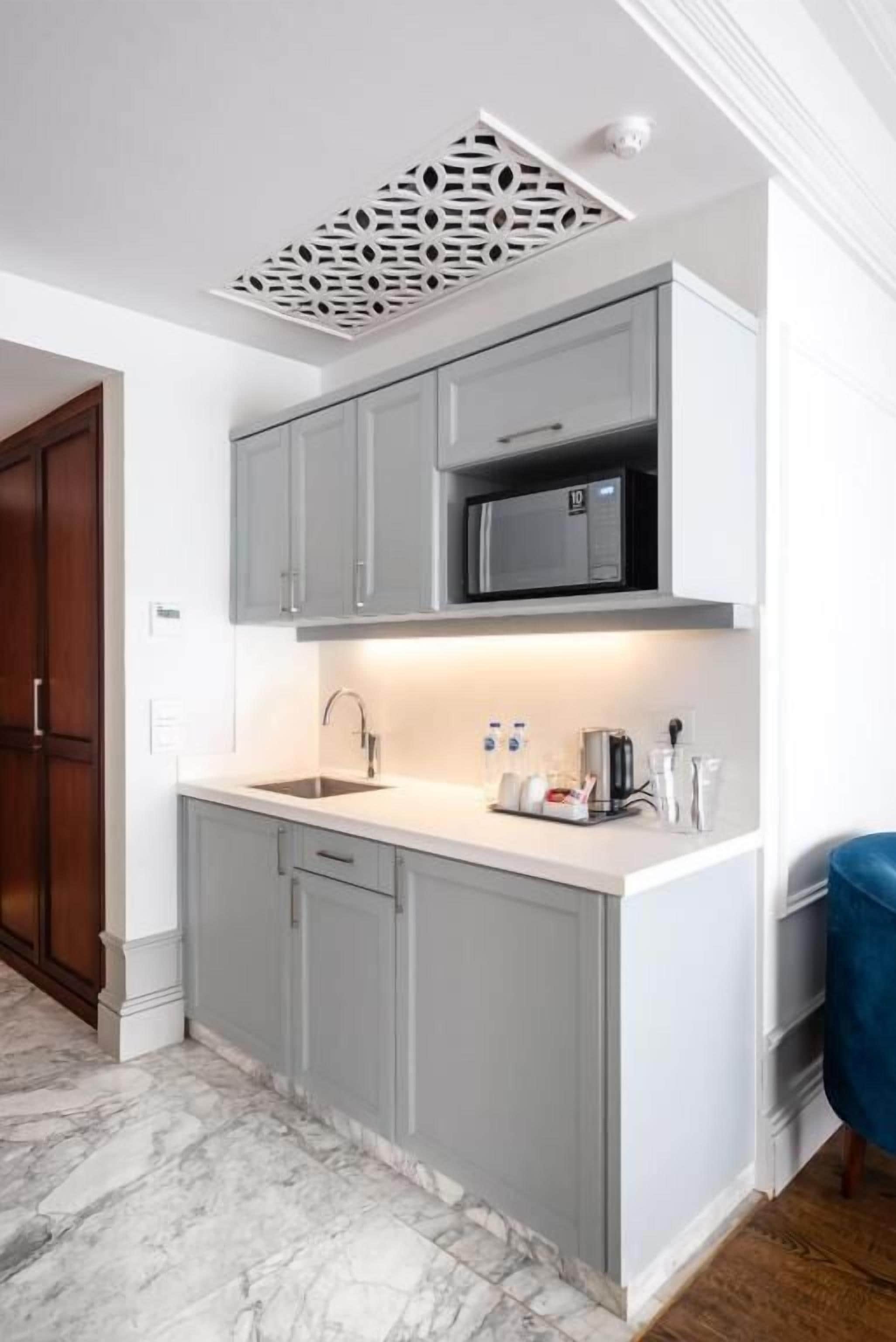 Mini-fridge, microwave, cookware/dishes/utensils