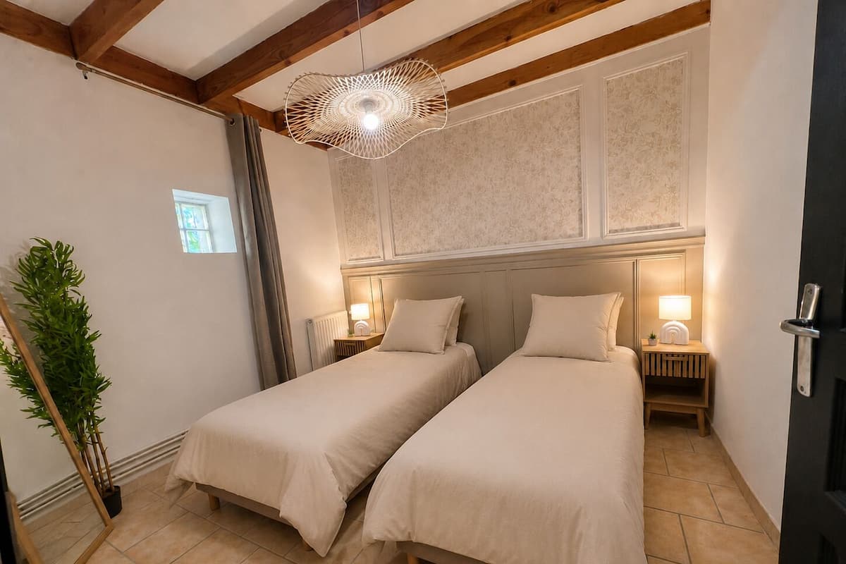 Premium bedding, desk, laptop workspace, blackout curtains