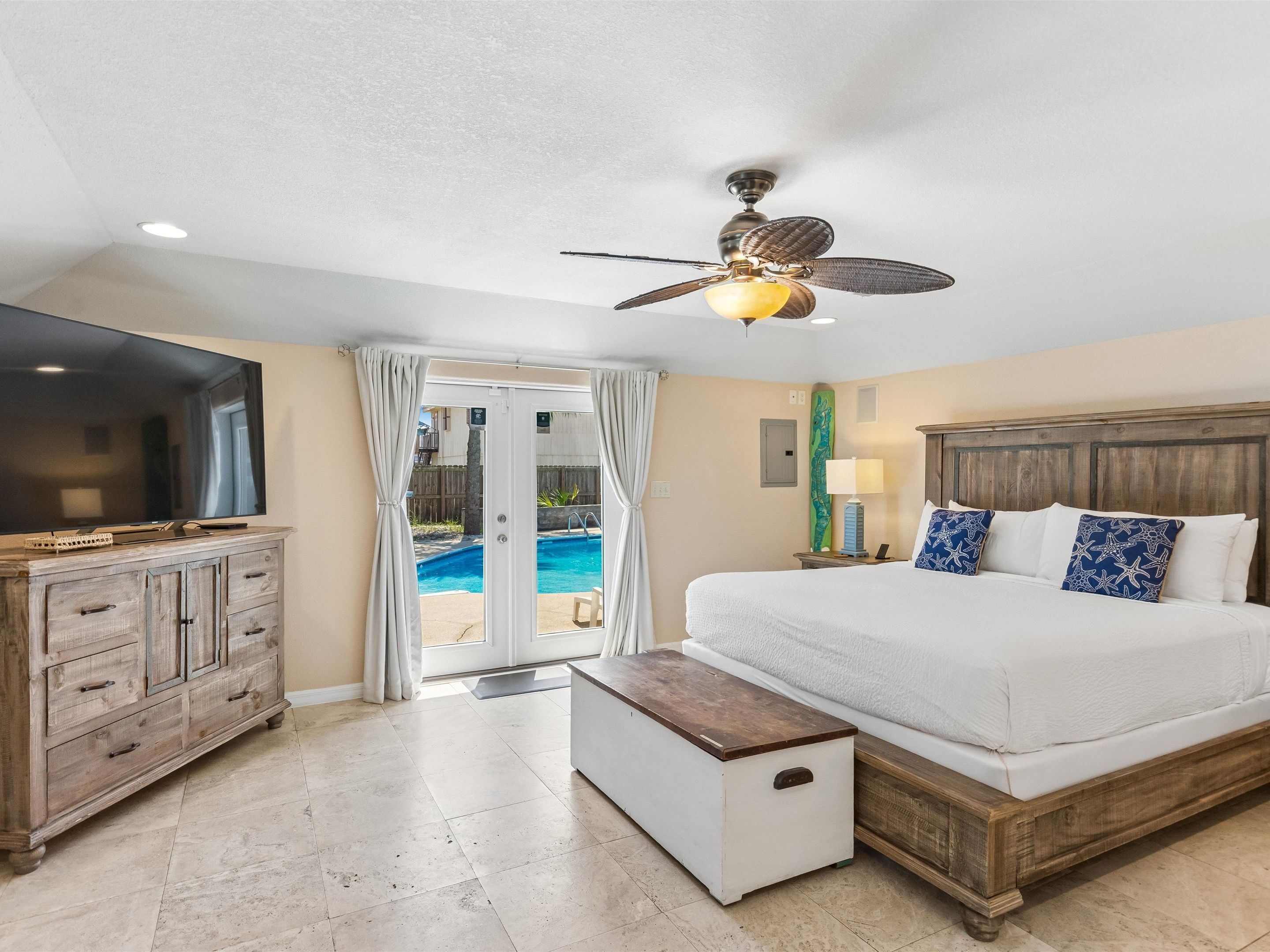 Primary Bedroom - Patio Access + Smart TV