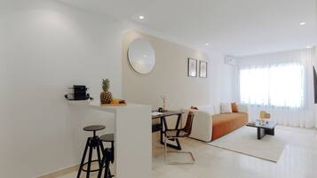 Appartement, balcon, vue ville | Wi-Fi gratuit