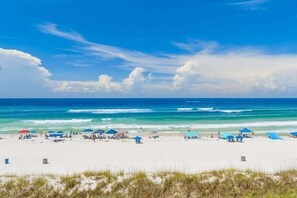 A beach with white sand, clear blue sky, and ocean. - Gulf Front Paradise - Large Wraparound Balcony - Sleeps 6 - Mariner West (Panama City)