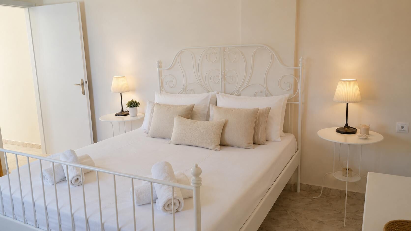 Elegant Bedroom with White Metal Bed and Soft Lighting