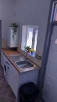Apartamento, 2 quartos | Lavanderia